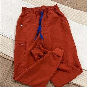FIGS rust orange scrub pants